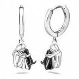 Обеци с кучешка висулка